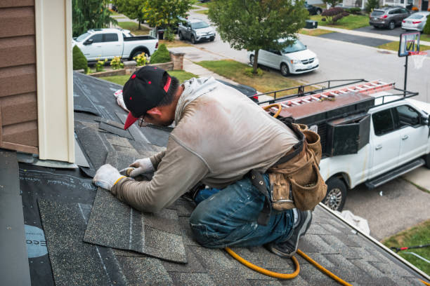 Professional Roofing technician working in White Cottage, OH